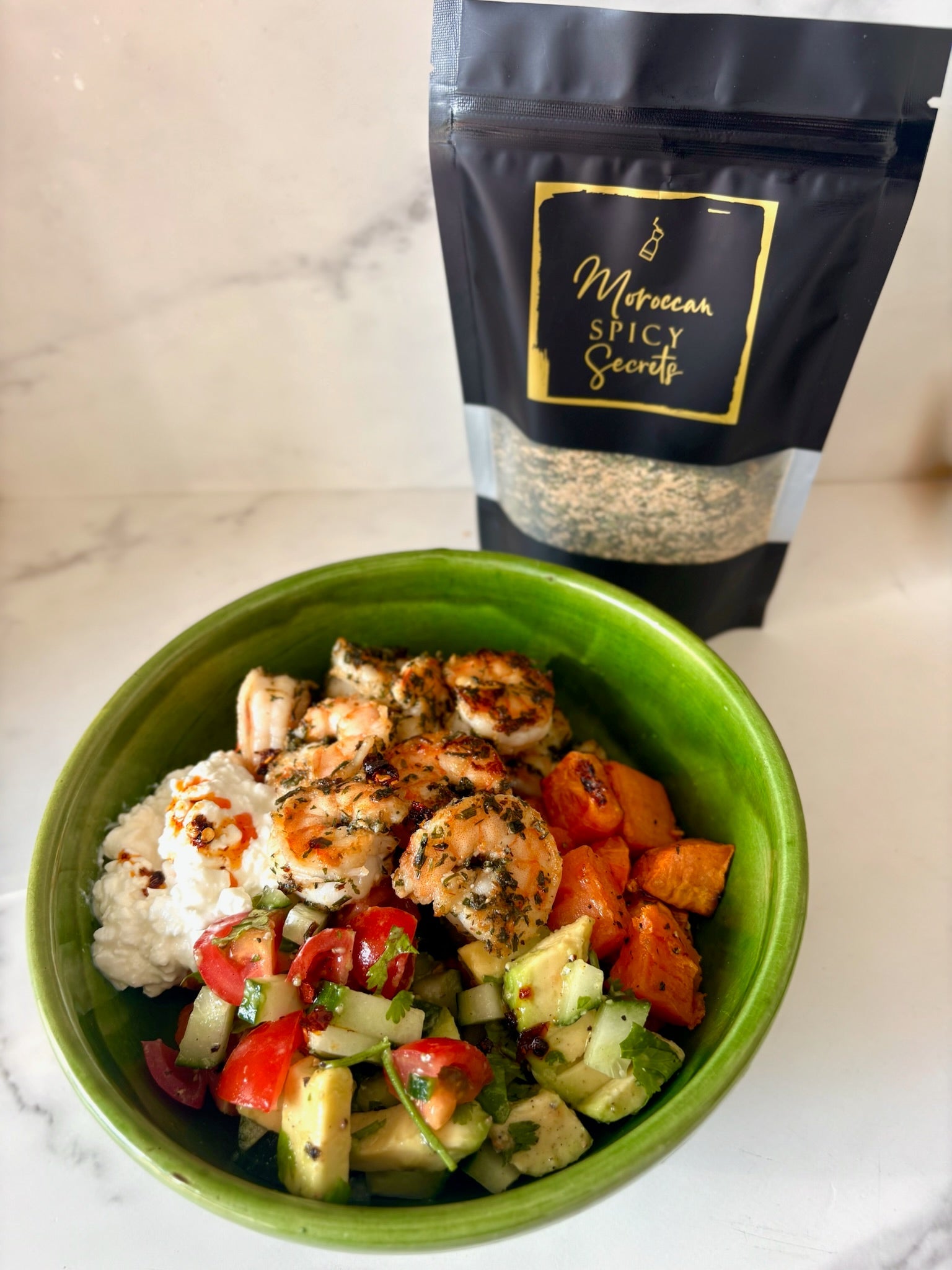 Sweet potato bowl met scampi en look van Moroccan Spicy Secrets