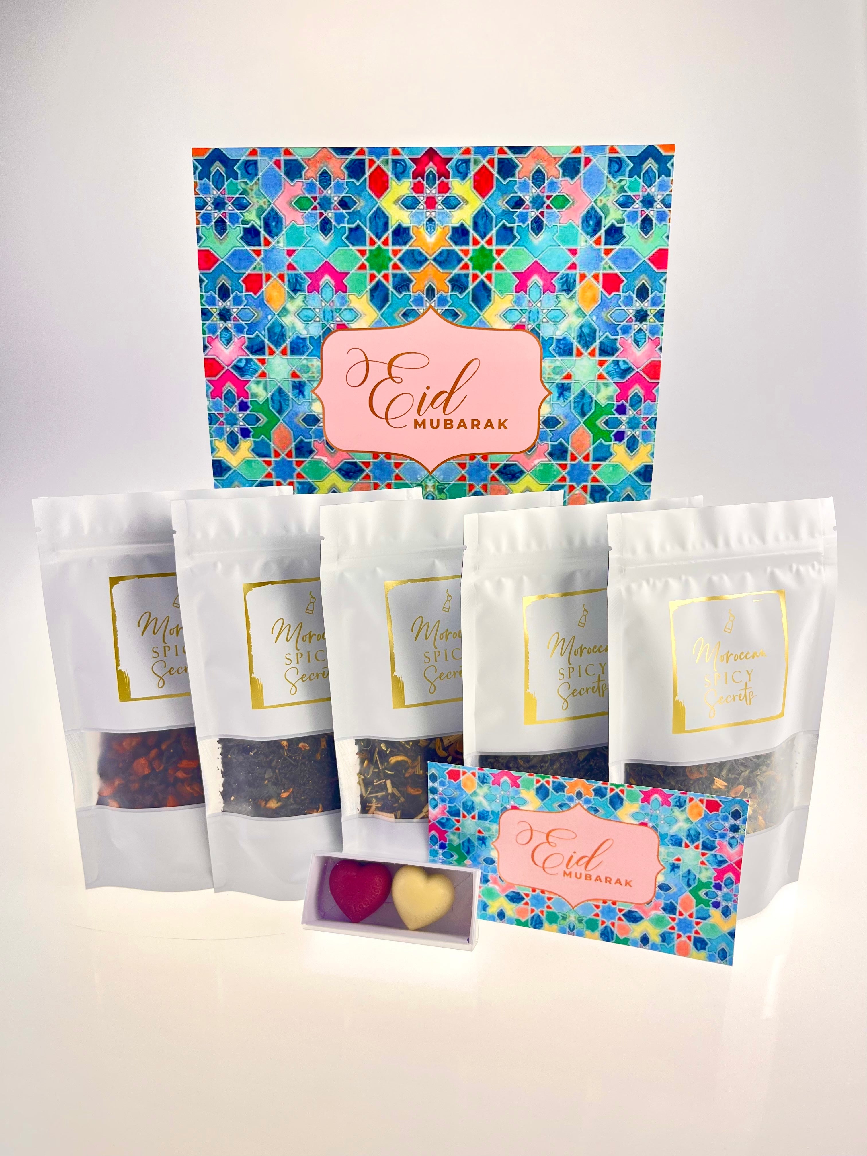 Colorful Eid gift box with herbs or teas