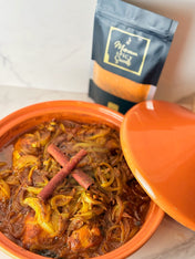 Tajine kip met ui en rozijnen