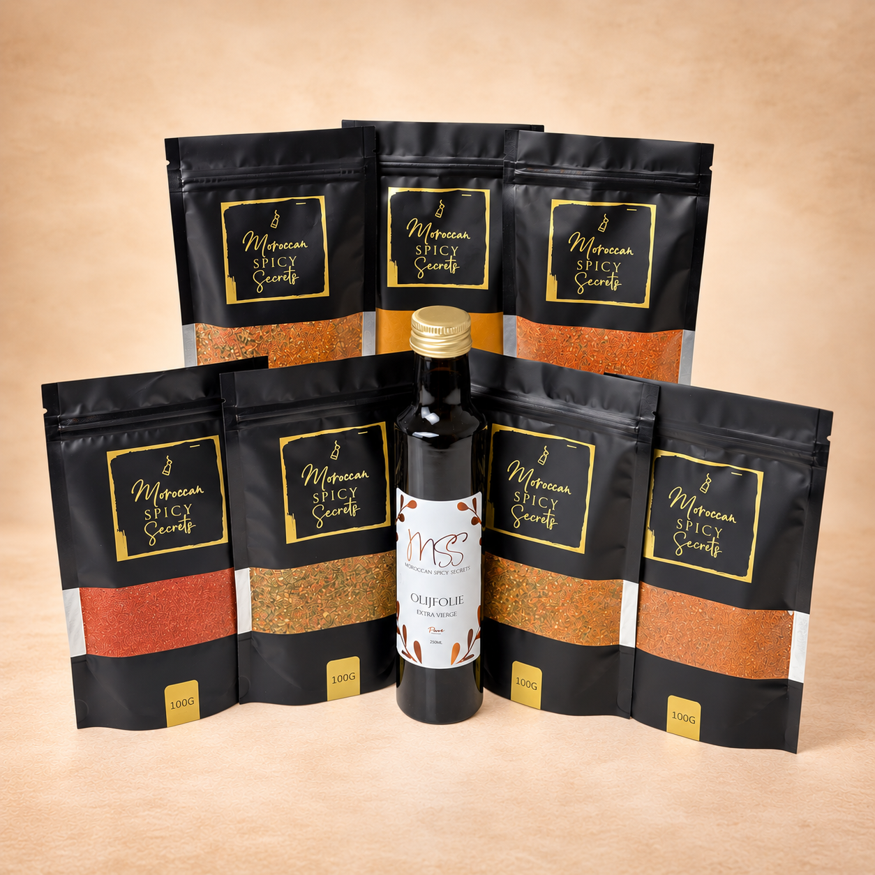Marokkaans Tajinepakket met zeven kruidenmixen van 100 g en een fles olijfolie extra vierge van Moroccan Spicy Secrets